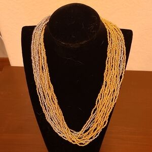 Elegant Multistrand Gold and Silver Necklace